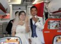 Koudai e Tae se casaram em um voo fretado da Jetstar. Foto: Reprodução/Kyodo News.