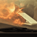 Fire seen inside a vehicle through the windshield, engulfing a white rectangular object on the passenger side.