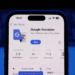 iPhone screen displaying Google Translate app listing in the App Store with a Get button and rating stars