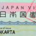 Close-up of a Japan visa showing the text JAPAN VISA and Place of issue Jakarta on a colorful background.