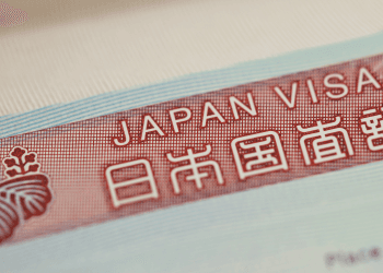 Close-up of a Japan visa booklet page with the words 'JAPAN VISA' and Japanese characters