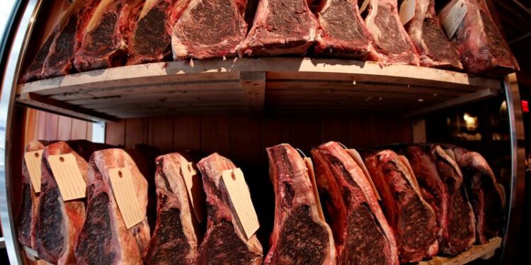 Cuts of USDA prime dry-aged beef are seen in the dry-aging room in the lobby of Gallaghers steakhouse in the Manhattan borough of New York City