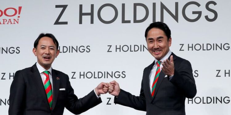 FILE PHOTO: Co-CEOs of Z Holdings Kawabe and Idezawa hold a news conference in Tokyo