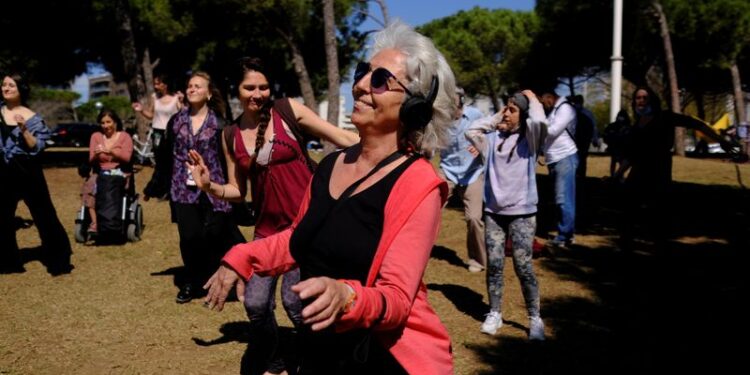 People join socially-distant silent disco in Barcelona